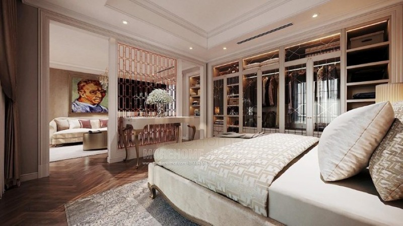 Bàn gỗ tân cổ điển kết hợp vách ngăn trang trí mạ vàng tạo nên không gian sang trọng, đẳng cấp cho phòng ngủ master cao cấp. thiết kế thi công nội thất biệt thự cao cấp