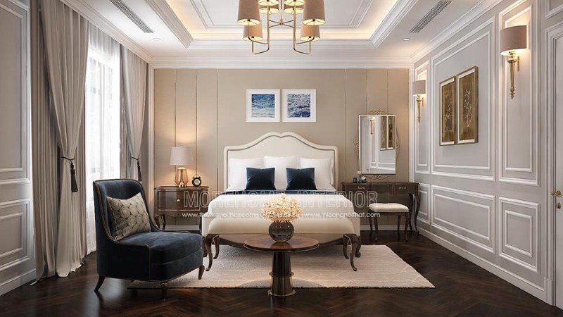 Giường ngủ gỗ óc chó bọc nệm trắng kết hợp đường nét uốn lượn tạo nên điểm nhấn ấn tượng cho phòng ngủ tân cổ điển sang trọng, quý phái. công ty thiết kế nội thất cao cấp