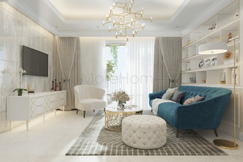 Bộ sofa tân cổ điển bọc nỉ màu xanh ấn tượng được coi là điểm nhấn sang trọng, tạo sự tươi mới cho không gian phòng khách của gia chủ Sofa tân cổ điển
